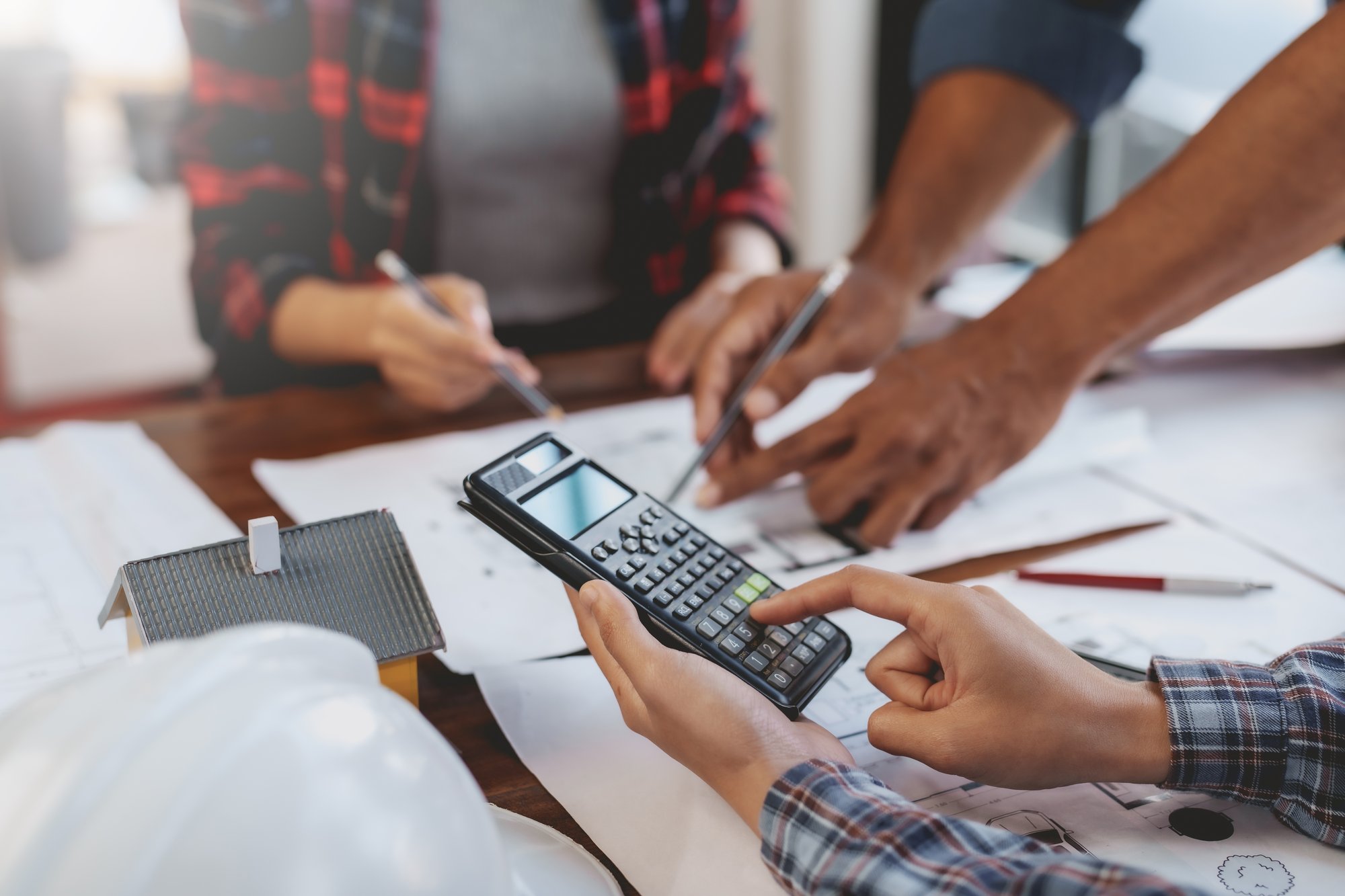 architect-or-engineer-are-meeting-to-discuss-house-2024-01-30-15-35-25-utc